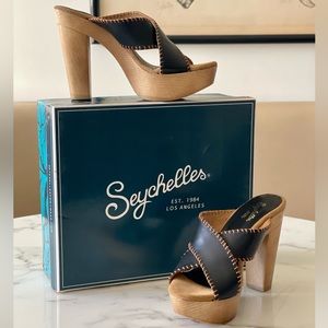 Regency black platform sandal heels by SEYCHELLES